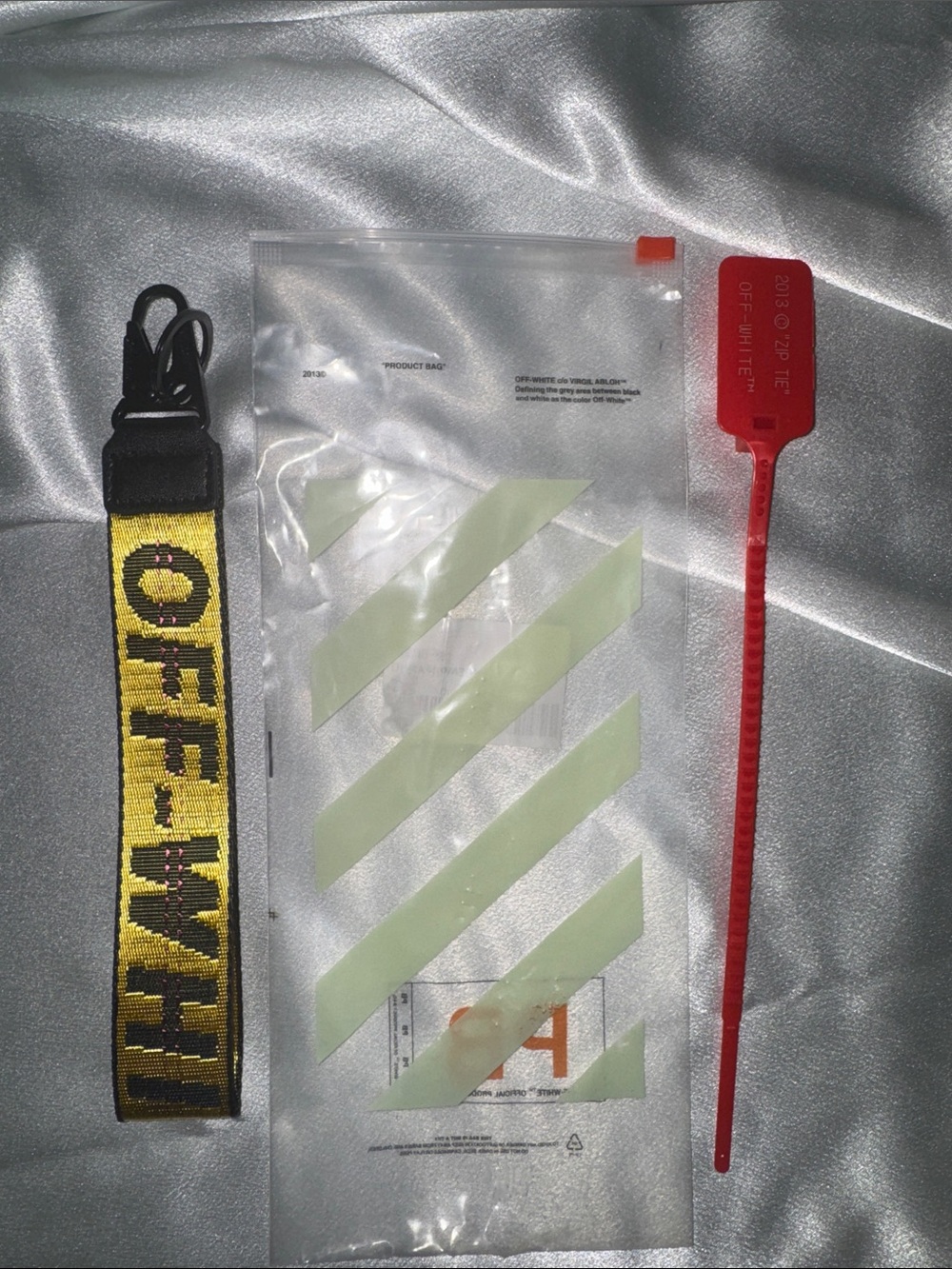 Off-White Yellow and Black Logo Key Strap with Red Zip Tie